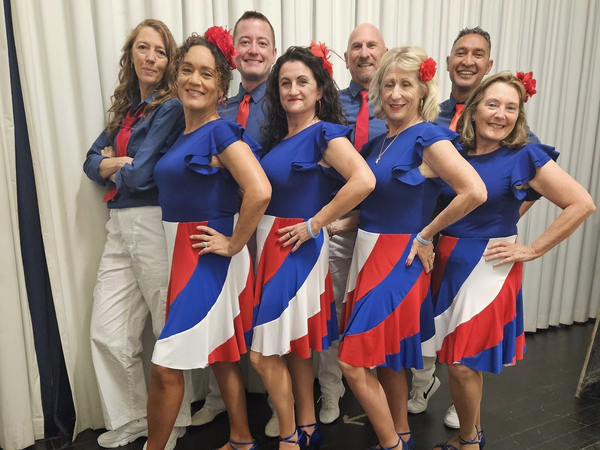The Cuban Soul team in matching red, white and blue costumes